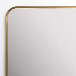 Kirklands Home Framed Mirrors|Antique Brass Nouveau Linear Curved Corner Mirror Gold