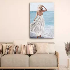 Kirklands Home Canvas Art|Coastal Woman in White Canvas Art Print, 32x48 in.