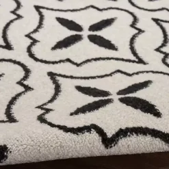 Kirklands Home Outdoor Rugs|Ivory & Black Quatrefoil Indoor/Outdoor Rug, 5x7