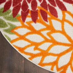 Kirklands Home Outdoor Rugs|Red Floral Burst Outdoor Round Area Rug, 7 ft.